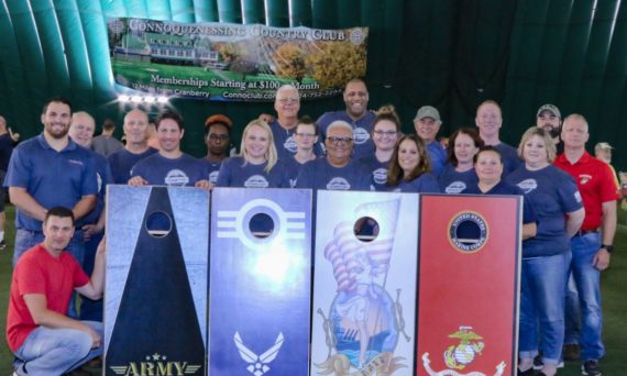 group of cornhole players at the myway mobile storage cornhole game